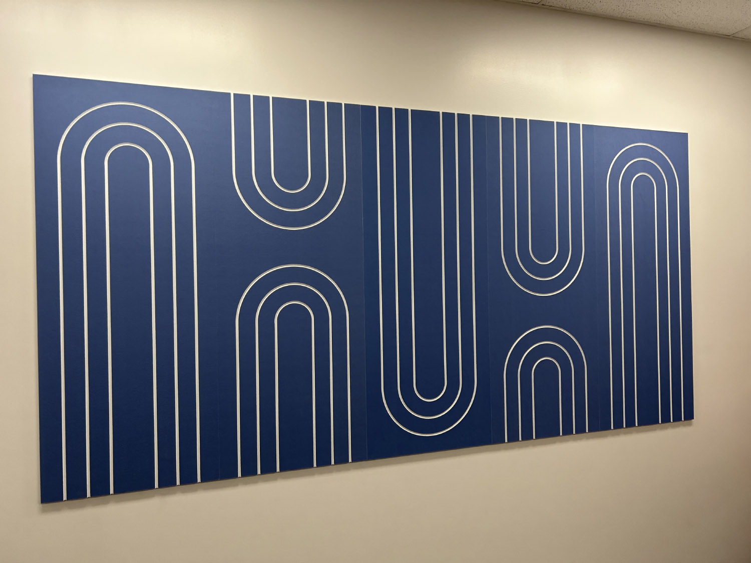 Acoustic wall panel with pattern